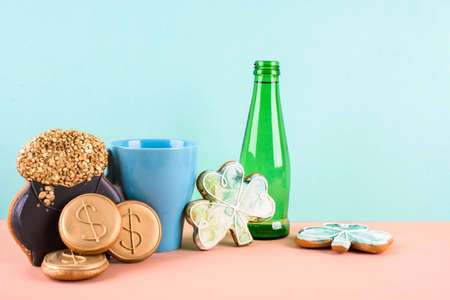 March 17 is St. Patrick's Day. Composition of sweet gingerbread on a light background. A place for...