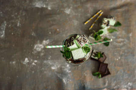 Mint and delicious marshmallows in a beautiful glassy glass with sprigs of fresh mint. Cocktail of marshmallowsの写真素材