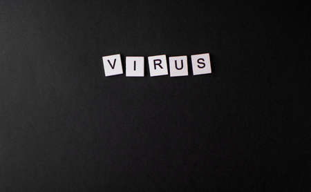 Animated Coronavirus Word Virus on a Black Background. Place for text. Covid-19の写真素材