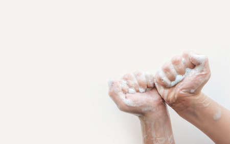 The baby's soap hands on a light background.Clean hand concept idea. Health care Coronavirus protection.の写真素材