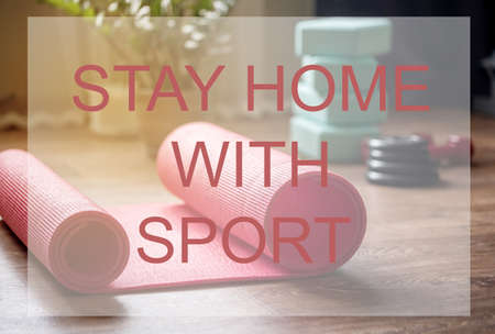 Home workouts at home using a mat, dumbbell, stretch marks. Home online fitness.