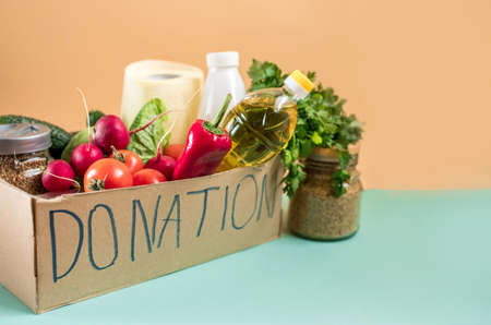 Donation box with various food. Copy space.の写真素材