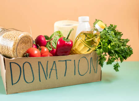 Donation box with various food. Copy space.の写真素材