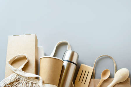 Set of unbleached plant fiber food box and paper coffee cup. Natural fiber eco food and drink...