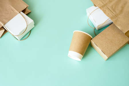 Recycling concept. Delivery food background. Fast food eco packaging on light backgroundの写真素材