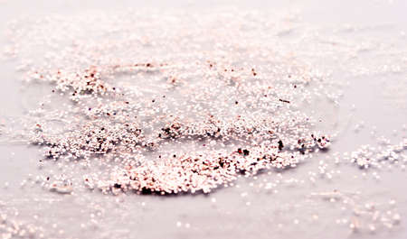 Liquid texture gel with sequins. Brilliant texture on a colored background.Contentの写真素材