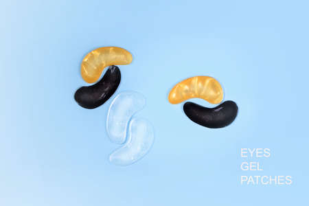 Transparent, gold, black patches under the eyes on a blue background. View from above. Place for textの写真素材