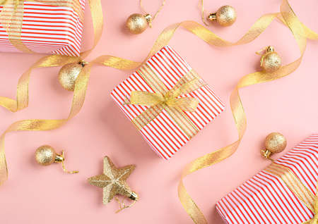New Years content. Beautiful gifts, wrapping paper, decor, ribbon, sprigs of spruce, Christmas toys....