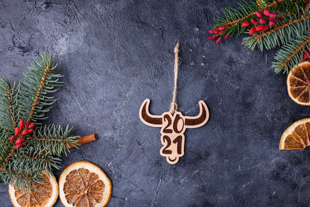 Symbol of the new year. A year of the bull. Wooden toys on Christmas trees in the form of beautiful bulls.の写真素材
