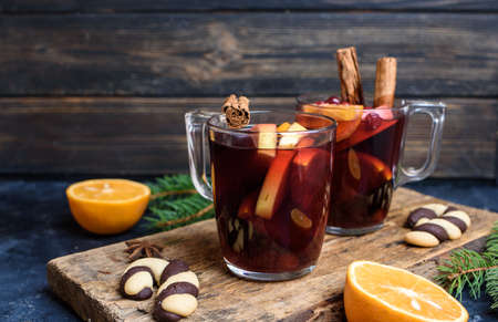 Hot Mulled Wine for winter and Christmas on wooden table with copy space. Red Hot wineの写真素材