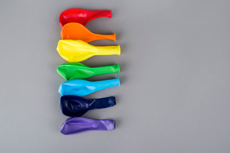 Small multicolored inflatable balls in the rainbow palette, art concept. Colorful balloons. Graduation Rainbow themeの写真素材