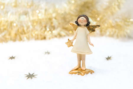 Christmas card in gold colour.の写真素材