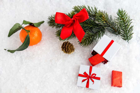 Christmas card with orange, chocolate and decoration. Space for your textの写真素材