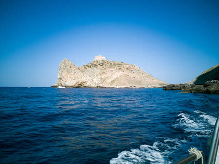 The little island of Marettimo in Sicily seen from a boat. Here the detail of Punta Troia and its...