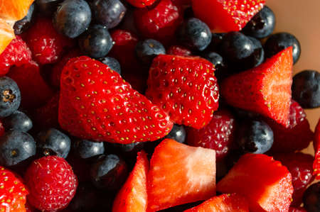 Mix of fresh red fruits, full of healthy vitamins and nutrients