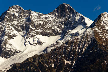 Mountain peak on the italian alps in Valle d'Aosta on the trekking trail "Monte Rosa RandÃ²"の写真素材