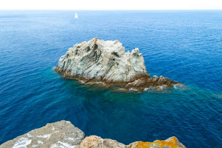 Carachteristic sea rock called "la nave" or the ship in Elba island seen from Monte Enfola peakの写真素材