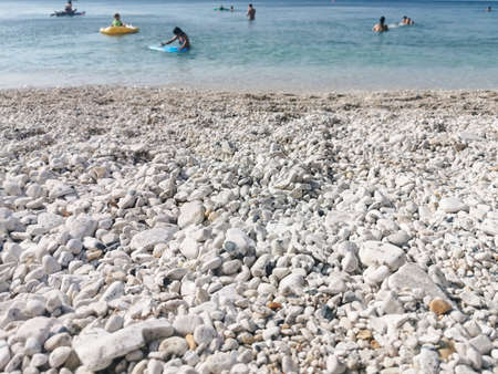 Capobianco beach in Elba Island, Italy. White pebbles and cristal clear turquoise waterの写真素材