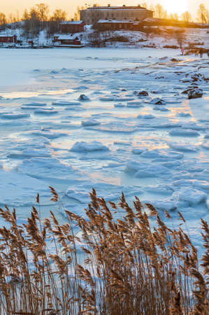 Frozen coastline and ocean in Helsinki, Finland in winter time. Here we were in Kaivopuisto parkの写真素材