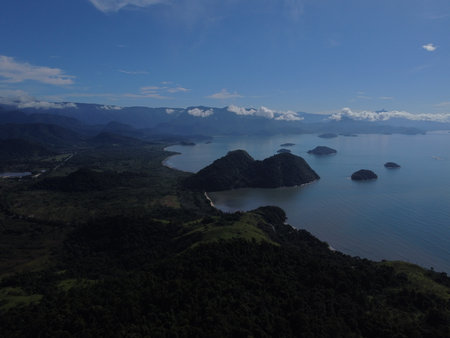 Drone view of Paraty, Rio de Janeiro, showcases lush Atlantic Forest, vibrant coastlines, and many small islands in the sparkling sea.の写真素材