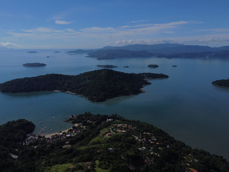 Drone view of Paraty, Rio de Janeiro, showcases lush Atlantic Forest, vibrant coastlines, and many...