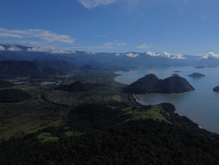 Drone view of Paraty, Rio de Janeiro, showcases lush Atlantic Forest, vibrant coastlines, and many small islands in the sparkling sea.の写真素材