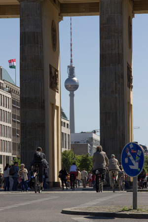 View of the TV tower in Berlin through the Brandenburg gate.のeditorial素材