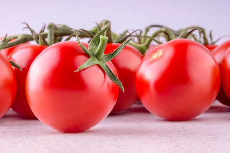 Beautiful ripe tomatoes on white background. Ingredient for many dishes, sauces, salads and drinks.の写真素材