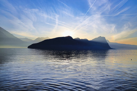 A magnificent play of colors at dusk on Lake Lucerne in Vitznau. Switzerland, Europe.