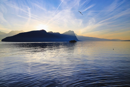 A magnificent play of colors at dusk on Lake Lucerne in Vitznau. Switzerland, Europe.の写真素材