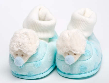 Baby booties with hedgehogs
