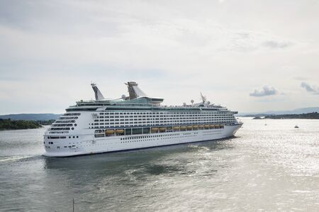 Huge Passenger Ship Leaving Harborの写真素材
