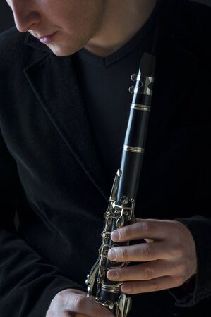 Musician and his Clarinet - all in blackの写真素材
