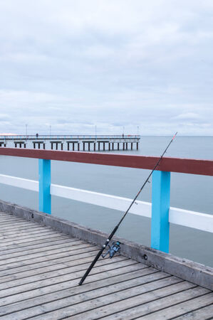 Fishing rod on The Baltic Sea jettyの写真素材