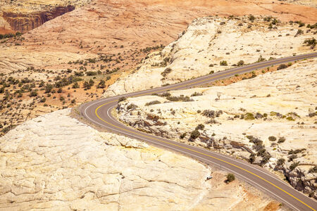Winding road through huge plateau in Utah, USAの写真素材