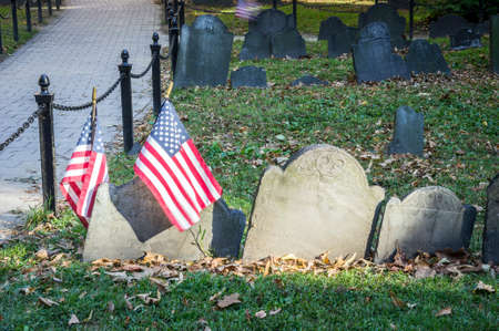 Old cemetery with US flags in Boston,  Massachusetts, USAの写真素材