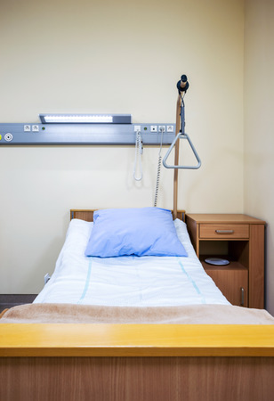 Modern hospital interior. Hospital bed in a ward.の写真素材
