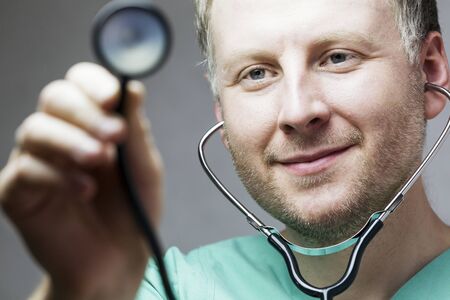 Close up of smiling doctor with stethoscope