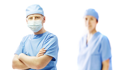 Surgeon doctor and nurse in a medical clothesの写真素材