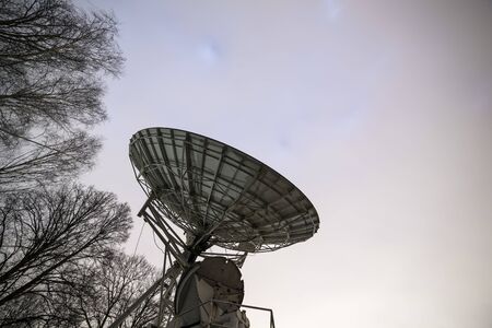 Big satellite dish with which signals are transmitted to or received from a communications satellite.の写真素材
