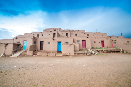 Adobe settlement â consisting of dwellings and ceremonial buildings â represents the culture of the Pueblo Indians of Arizona and New Mexico.のeditorial素材