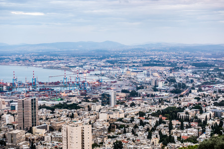 Panorama of Haifa - port, Bahai gardens and modern buildings at sunset, Israelの写真素材