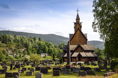 Old, wooden stave church in Norway originated in medieval times when christianity was mixing with pagan Vikingsの写真素材