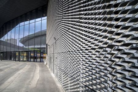 Entertainment hall called Spodek reflected in International Congress Center, Katowice, Poland