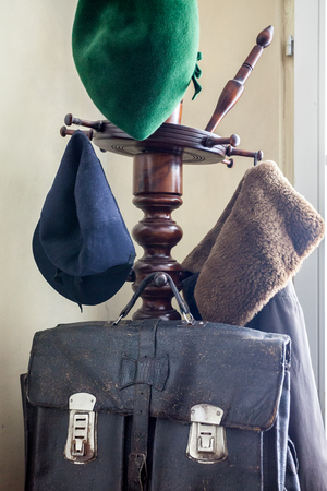 Vintage caps, coat and bag on the hanger - all from 1940'sの写真素材