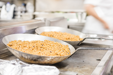 Cooking portuguese rice and bean in the restaurantの写真素材