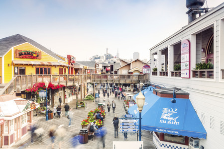 September 27, 2012, San Francisco, USA: Famous pier 39 with wooden architecture and downtown of the city in the backgroundのeditorial素材