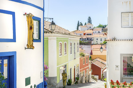 Colorful facades of small portuguese houses in picturesque Monchique, Algarve, Portugalの写真素材