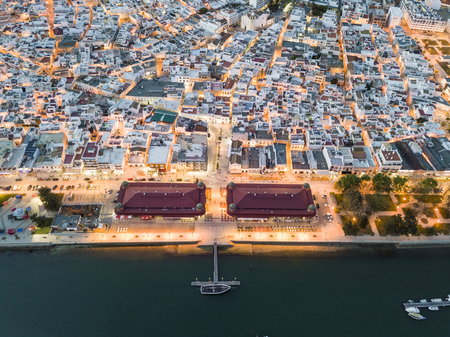 Olhao with two market buildings by Ria Formosa in the evening, Algarve, Portugalの写真素材