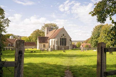 Old British church made of stone located in rural area in the south of England, UK
